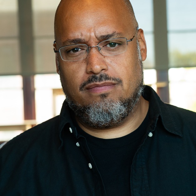 Michael Seibel wearing glasses and a black shirt